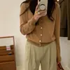 Cárdigan de punto grueso con cuello redondo para mujer, nueva colección otoño/invierno 2026, estilo coreano, suéter simple y estilizado, prenda exterior versátil, moderno