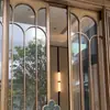 Puerta de entrada de diseño de vidrio de acero inoxidable de alta gama personalizada, puerta de entrada corredera de hotel, puerta de vidrio de acero inoxidable con resorte de piso