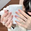 Tendencia de Tiktok Uñas Postizas Portátiles Hechas a Mano Color Rubor Cuentas de Vidrio Ojo de Gato Atmósfera Elegante Blanqueamiento Pegatinas para Uñas Postizas