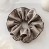 Goma para el pelo de leopardo color marrón Maillard para otoño e invierno, liga para el pelo de alta gama, nuevo y elegante accesorio para el cabello 2026