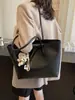 Bolsa grande com padrão de lichia para mulheres, nova coleção 2026, leve e luxuosa, adequada para o dia a dia, bolsa tote moderna, bolsa de ombro e bolsa de axila