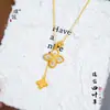 Collar con Borla de Trébol de Cuatro Hojas de Concha Blanca Incrustada de Diamantes Chapado en Oro de 24 Quilates de la Tienda de Oro Puzuo, Cadena de Clavícula de Gama Alta, Moderna y Versátil