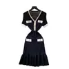 Vestido de punto francés vintage de color contrastante con cuello en V, manga corta, hebilla metálica en la cintura, ajustado, de verano, para mujer, estilo cola de pez