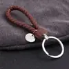 Al por Mayor Punto Creativo Cuerda de Cuero Trenzada Círculo Único Llavero Muñeca Bola de Pelo Llavero Accesorios para Llaves Joyería