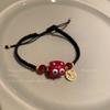 Livrinho Vermelho com Pulseira Tecida da Marca Fu de Monstrinho Fofo Design de Nicho Feminino Senso Avançado Corda de Mão de Gato