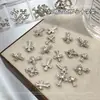 Accesorios para Uñas Cruz de Plata Paquete Mixto Nuevo y de Moda Cruz de Aleación Tridimensional Decoraciones para Uñas DIY de Circonita