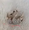 Broche Sentido Avanzado Nicho Lujo Ligero Corsage para Abrigo Piedras de Strass de Gama Alta Animal Versátil Mariposa Pavo Real Joyería Al por Mayor