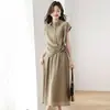 Verão 2025 Novo Colete de Algodão com Cadarço Ajuste na Cintura Conjunto Casual Fashionável Elegante Saia Saia Midi Roupas Femininas