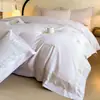 Juego de cuatro piezas para dormitorio de algodón sateen 100% algodón de fibra larga de alta gama clase A bordado estilo lujo ligero algodón puro ropa de cama para todas las estaciones