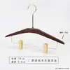 Percha para pantalones de madera maciza en color nogal negro, especialmente para tiendas de ropa, para uso doméstico y de hotel, sin marcas, antideslizante, percha con pinza de madera para pantalones al por mayor
