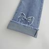 Jeans Retro Americanos con Borde Deshilachado, Pantalones Bootcut, Nuevos 2025 de Cintura Baja Lavados Desgastados con Decoración de Mariposa de Pierna Ancha
