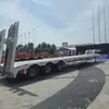 Semirremolque transfronterizo de Asia Central para transporte de ingeniería, semirremolque de plataforma baja de 3 ejes, semirremolque de plataforma plana tipo gancho de 60 toneladas