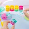 Pequeño Mini cara sonriente resorte arcoíris círculo caricatura anillo de apilamiento creativo juguetes educativos para niños 12 por bolsa