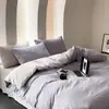 Juego de ropa de cama de algodón 100% de grado A para maternidad e infantil, juego de cuatro piezas de algodón puro con un diseño de dos tonos simple y de alta gama, que incluye funda de edredón, sábana plana y sábana bajera