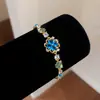 ¡Encanto floral azul brumoso! Pulsera de flor de circón azul, sensación de lujo ligero y alta gama, un accesorio dulce y fresco para niñas