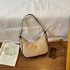 Bolso de mujer de material PU delicado con líneas de cuerpo de bolso lisas diseño de un solo hombro bolso de mano versátil nuevo bolso de un solo hombro