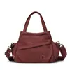 Design Original 2026 Nova Mochila Transversal de Nicho Versátil Roupas de Trabalho Bolsa de Ombro Multiuso de Grande Capacidade Bolsa Transversal para Mulheres