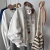Sudadera de cuello redondo estilo americano para mujer, nueva colección 2026, diseño moderno, holgada y chic