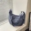 Bolso bandolera popular de tela Oxford para mujer de este año, nuevo bolso casual tipo 'dumpling' de un solo hombro para estudiante, clase, commute 2026