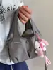 Bolsa de Ombro Portátil Grande Capacidade Moda Verão 2025 Tendência Casual Estilo Fashionável Aparência Sofisticada Nicho para Mulheres