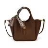 Bolsa de Balde Texturizada de Alta Qualidade Portátil Feminina 2026 Novo Estilo Moda Retrô Bolsa de Ombro Simples Versátil para o Dia a Dia Bolsa Transversal