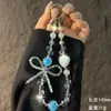 Cadena para Teléfono Móvil de Lujo Ligero con Borde de Corazón de Pedrería Corta Exquisito Colgante de Teléfono Móvil con Lazo de Cristal Llavero Colgante para Bolso