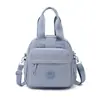 Mochila casual versátil de color liso, de nailon, transfronteriza, bolso de hombro simple, bolso cruzado de moda estilo japonés, bolso multifuncional