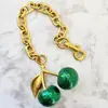 Chaveiro de Cereja Dourada Tuhao Vermelho e Verde Transfronteiriço Europeu e Americano Pingente de Bolsa de Cristal de Resina de Cereja