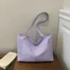Bolso de mujer transfronterizo de gran capacidad, nueva colección otoño 2026, bolso de hombro versátil y a la moda, bolso tote moderno y casual para el trabajo y el uso diario