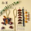 Kit de materiales DIY para hacer un móvil de conchas de fruta, una campana colgante sanadora, con fruta negra indonesia, adelfa, nenúfar y ratán