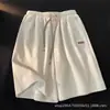 Venta al por mayor de nuevos estilos de primavera y otoño para tiendas online independientes: pantalones cortos casuales para hombre, de color liso, pierna recta, modernos y cómodos