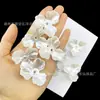Material para ramo de flores de magnolia hecho a mano DIY, pétalos de flor de cuatro hojas con cuentas, tejido con cuentas, accesorios creativos de flor de simulación para sostener