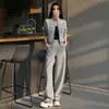 Conjunto deportivo casual para mujer, nueva colección de otoño, chaqueta a rayas de corte holgado con cuello alto, pantalones versátiles de pierna ancha, efecto adelgazante, conjunto de dos piezas