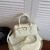 Otoño 2026 Nuevo Bolso Boston Simple de Alto Valor Estilo Coreano Moda de Nicho Elegante Bolso de Hombro Cruzado para Mujer
