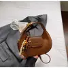 Bolso de Mano Simple de Alta Gama 2025 Otoño e Invierno Nuevo Versátil Diseño de Nicho Retro Bolso de Hombro Cruzado Único
