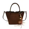 Bolso de mano vintage para mujer 2026 otoño e invierno nuevo bolso de hombro casual simple bolso tote versátil para el trabajo