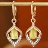 Aretes Ojo de Ángel Ojo de Gato para Mujer Estilo Francés Lujo Ligero Creativo Diamante Gota Aretes Estilo Europeo y Americano Diamante Oreja Trendy