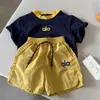 Youmi 2026 Conjunto de Duas Peças Colorido de Verão para Meninos Conjunto de Shorts Infantil Roupa Esportiva de Manga Curta para Crianças Camiseta de Manga Curta para Meninas
