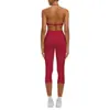 Conjunto deportivo de yoga con sujetador de yoga sin costuras de nuevo estilo transfronterizo con relleno incorporado, alta elasticidad, secado rápido y pantalones capri para correr