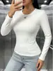 Camiseta de tricô branca slim fit de manga comprida para mulheres, justa, modeladora, top base versátil, estilo garota ousada, gola redonda, top curto