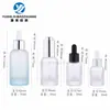 Em estoque novo 10ml30ml50ml frasco de vidro de ombro redondo e fundo grosso frasco spray para essência frasco conta-gotas cosmético