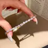 Pulseira com pingente de estrela quadrada de zircônia cúbica europeia e americana, apresentando um design retrô e minimalista, uma pulseira única e elegante com um toque de luxo e sofisticação