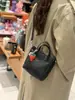 Bolsa Feminina Nova para o Dia a Dia 2026 de Cruzamento de Fronteira Bolsa de Mão Retrô Bolsa Saco Couro Macio Versátil Bolsa de Ombro Transversal