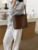 Bolso cruzado de patrón tejido casual, bolso de hombro de nicho retro de lujo ligero, bolso versátil de cuero suave de alta gama para madre e hija