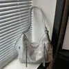 Bolsa feminina de alta qualidade 2026 nova mochila multifuncional de nicho bolsa de ombro para o dia a dia bolsa transversal de grande capacidade