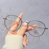 Exquisitas gafas redondas de alambre de oro fino, con lentes planas anti luz azul para uso diario, favorecedoras para la forma del rostro, montura de gafas versátil