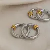 Pendientes de aro simples y versátiles con bloqueo de color transfronterizo, clips para orejas de acero inoxidable con baño de vacío de oro de 18 quilates, pendientes de alta gama al por mayor