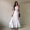 Vestido de tirantes de encaje blanco estilo francés para mujer, estilo resort de verano en la playa, temperamento puro y seductor, ceñido a la cintura, falda larga con dobladillo amplio