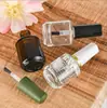 Botella vacía de pegamento para esmalte de uñas transparente de 15 ml, redonda, marrón, negra, resistente a la luz.