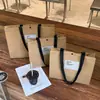 Tienda de Ropa Bolsas de Mano No Tejidas para Ropa de Mujer Empaque de Regalo Correas de Mano con Asa al Hombro Bolsas de Compras al por Mayor